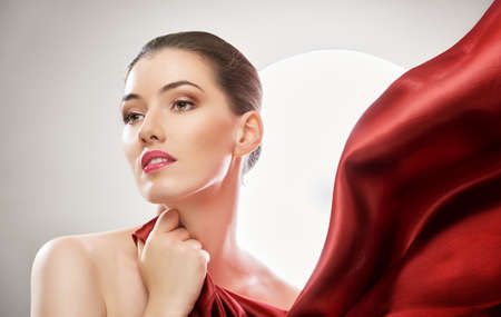 beautiful girl with red scarfの写真素材