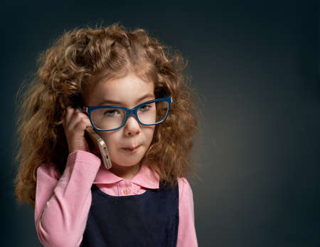 Child, talking on the phoneの写真素材