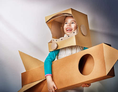 child is dressed in an astronaut costumeの写真素材