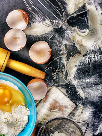Flour, eggs, and cooking utensils