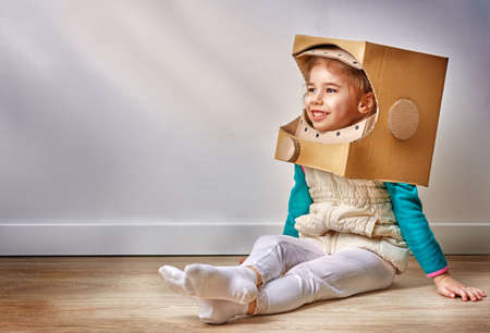 child is dressed in an astronaut costumeの写真素材