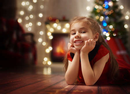 Cute little girl waiting for Christmas.の写真素材
