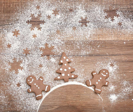 Gingerbread on wooden background