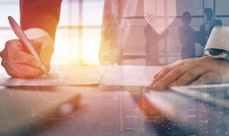 Close up businessman signing documents.の写真素材