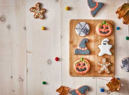 Happy Halloween! Sweets and cookies on the table in the home. Preparation for holiday.の写真素材