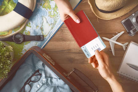 Go on an adventure! Couple preparing for the journey. Man and woman are planning trip.