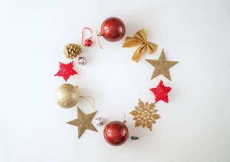 Happy New Year! Baubles on white desk. Top view. Holiday traditions. Space for your text.