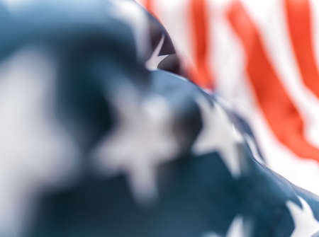Patriotic holiday. The USA are celebrating 4th of July. American flag close up.の写真素材