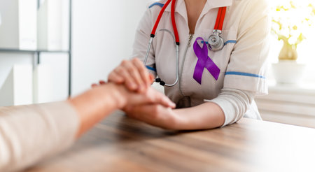 February 4 World Cancer Day. Female patient listening to doctor in medical office. Raising knowledge on people living with tumor illness.の写真素材