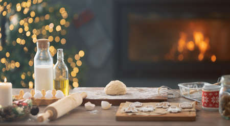 Merry Christmas and Happy Holidays. Cooking traditional food on the table in the kitchen.