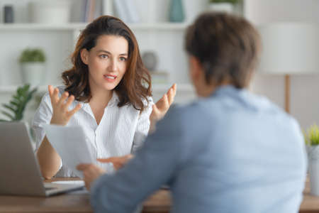 Man and woman are working in office. Collaborative teamwork.