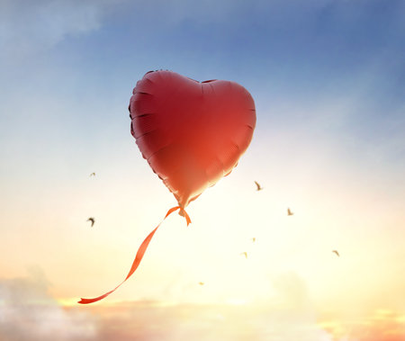 Happy Valentine's Day banner. Holiday background design with big heart air balloon.の写真素材