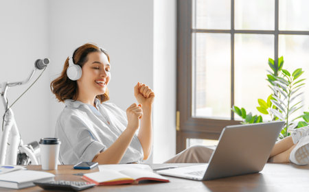 Happy casual beautiful woman working in the office.の写真素材