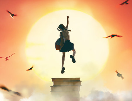 Back to school! Happy cute industrious child standing on the tower of books on background of sunset sky. Concept of education and reading. The development of the imagination.の写真素材