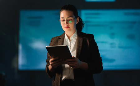 A woman is speaking on stage about the future of AI technologies.の写真素材