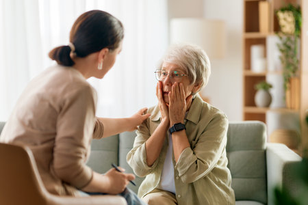 Consultation of senior female patient on reception for psychologist.の写真素材