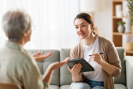 Consultation of senior female patient on reception for psychologist.の写真素材