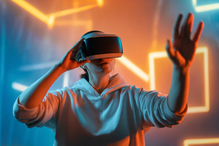 Metaverse technology concept. Woman with VR virtual reality goggles. Futuristic lifestyle.の写真素材
