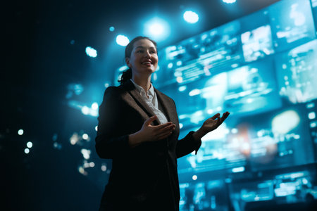 A woman is speaking on stage about the future and technologies.の写真素材