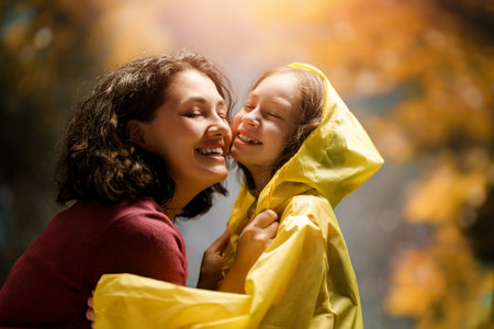 Happy family. Mother and child daughter on autumn walk