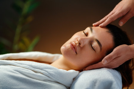 Facial treatment in spa salon. Skin care and massage. Cosmetologist at workの写真素材