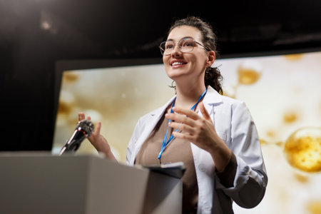 A woman is giving a presentation at a conference on care products.