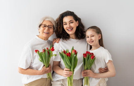 Heartwarming portrait of three generations of womenの写真素材