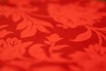 Texture of colorful red tablecloth.