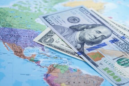 US dollar on globe world mapの写真素材