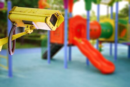 CCTV Closed circuit camera, TV monitoring at kindergarten school playground outdoor for kid children : security system concept.の写真素材