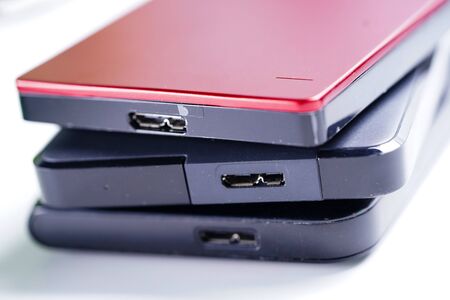 External hard disks for storage data on white background.の写真素材