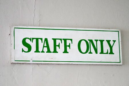 Staff only text sign symbol in hotel.の写真素材