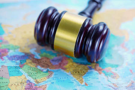 Bangkok, Thailand - January 15, 2019 Asia : Judge hammer on wold globe map. Law and justice court concept.のeditorial素材