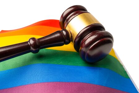 Gavel for judge lawyer on rainbow flag, symbol of LGBT pride month celebrate annual in June social of gay, lesbian, bisexual, transgender, human rights.の写真素材