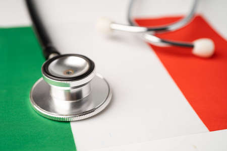 Black stethoscope on Italy flag background, Business and finance concept.の写真素材
