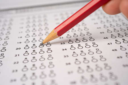 Answer sheets with Pencil drawing fill to select choice, education conceptの写真素材