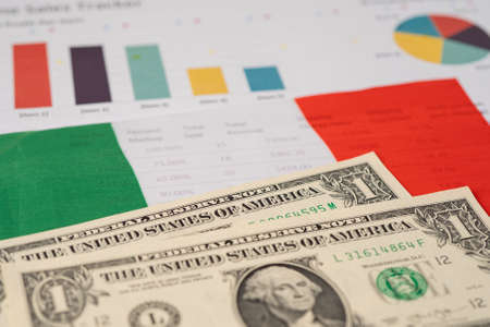 US dollar banknote on Italy flag with graph background, Business and finance concept.の写真素材