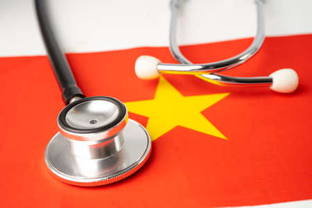 Stethoscope on China flag, check problem of business and finance concept.の写真素材