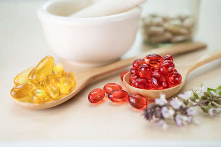Alternative medicine herbal organic capsule with vitamin E omega 3 fish oil, mineral, drug with...