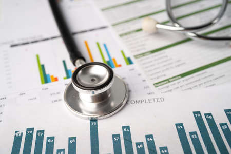 Stethoscope on charts and graphs paper, Finance, Account, Statistics, Investment, Analytic research...