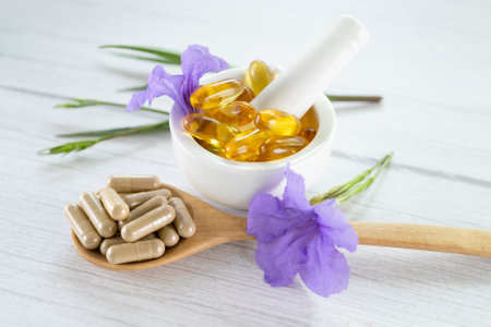 Alternative medicine herbal organic capsule with vitamin E omega 3 fish oil, mineral, drug with herbs leaf natural supplements for healthy good life.の写真素材