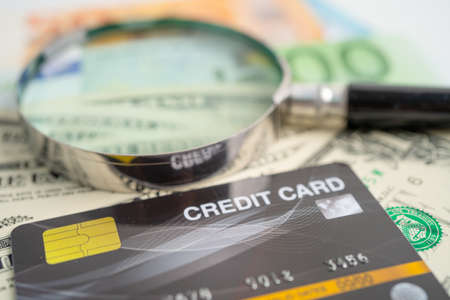 Credit card on US dollar banknotes. Finance development, Banking Account, Statistics, Investment Analytic research data economy, Stock exchange trading, Business company concept.の写真素材