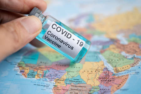 Bangkok, Thailand - July 1, 2021, Coronavirus Covid-19 vaccine on Africa map, development medical for doctor use to treat pneumonia illness patients.のeditorial素材