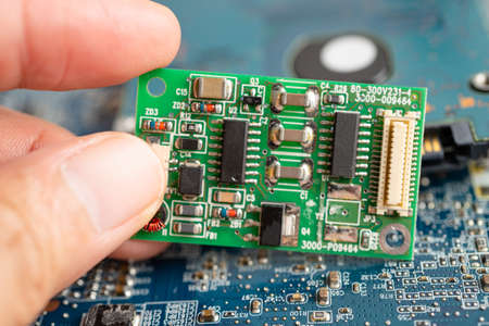 micro circuit main board computer electronic technology, hardware, mobile phone, upgrade, cleaning concept.の写真素材