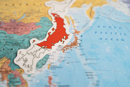 Bangkok, Thailand - September 20, 2021 Japan flag on world map background. flag on world map background.のeditorial素材