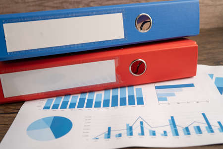 Binder data finance report business with graph analysis in office.の写真素材