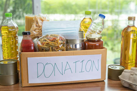 Foodstuff for donation, storage and delivery. Various food, pasta, cooking oil and canned food in...