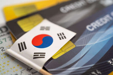 Korea flag on credit card. Finance development, Banking Account, Statistics, Investment Analytic research data economy, Stock exchange trading, Business company concept.の写真素材