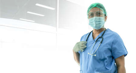 Asian doctor wearing face shield and PPE suit new normal to check patient protect safety infection...