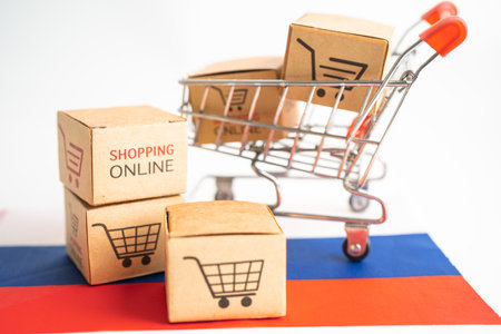 Box with shopping online cart logo and Russia flag, Import Export Shopping online or commerce finance delivery service store product shipping, trade, supplier concept.の写真素材